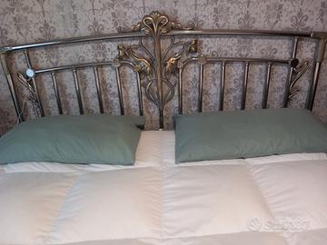 letto matrim. firmato e bagnato nell'argento