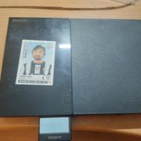 PlayStation 2 con giochi e controller 