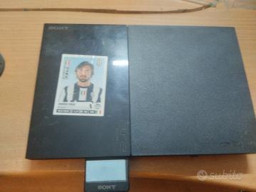 PlayStation 2 con giochi e controller 