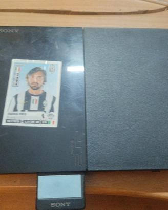 PlayStation 2 con giochi e controller 