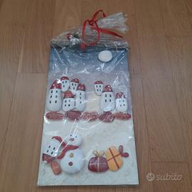 Quadro natalizio con sassi pitturati