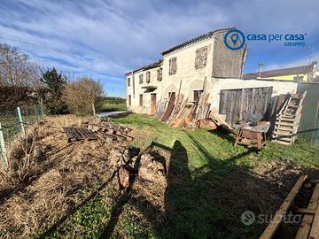 Terreno edificabile con rustico