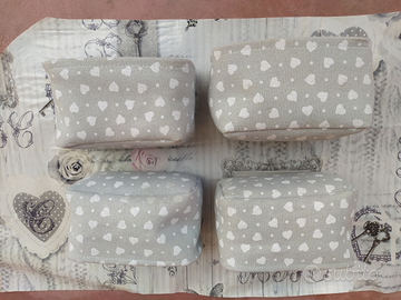 Cestini in stoffa con cestelli in metallo