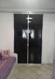 Porte in vetro scorrevoli per cabina armadio