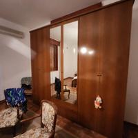 Camera da letto completa di armadio in legno