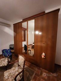 Camera da letto completa di armadio in legno