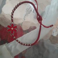 Braccialetto rosso con fiore 🌸 regolabile