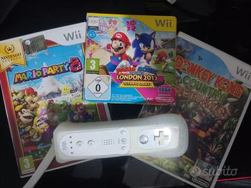 3 giochi wii + telecomando