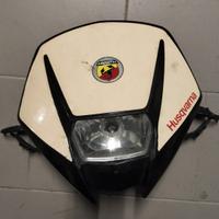 Mascherina e faro originali Husqvarna sm 125