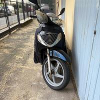 Honda Sh 150 -tucano urbano e bauletto