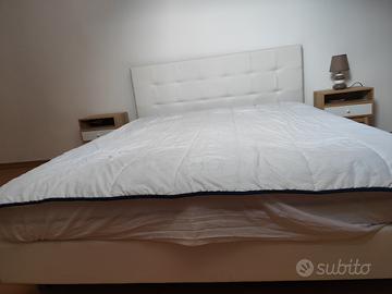 letto matrimoniale con testiera in ecopelle