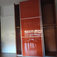 divano, armadio in blocco 