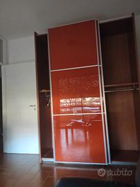 divano, armadio in blocco 