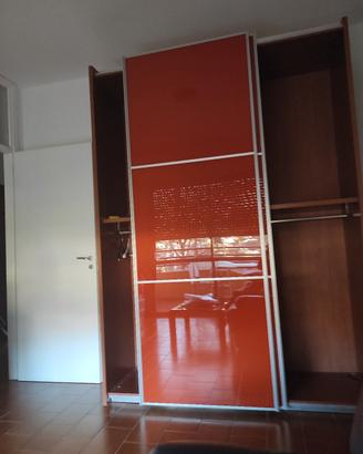 divano, armadio in blocco 