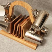 Set tazzine da caffè con piattini e porta-tazze