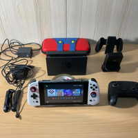 Nintendo Switch + Scheda SD + Giochi e Accessori