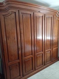 camera letto in legno noce