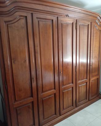 camera letto in legno noce