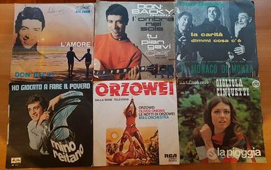 Dischi 45 giri in vinile di vari artisti e generi
