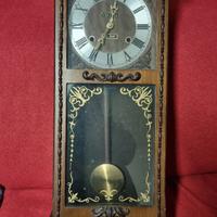 Orologio a pendolo antico