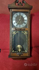 Orologio a pendolo antico