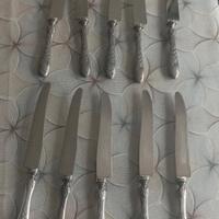 10 coltelli antichi in metallo argentato lavorato 
