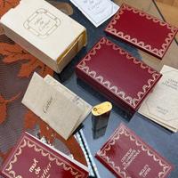 Accendino Cartier Santos oro/argento