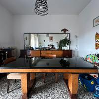 Tavolo di design in vetro nero e legno massello