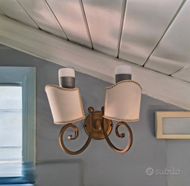 Elegante applique da parete con struttura in ferro