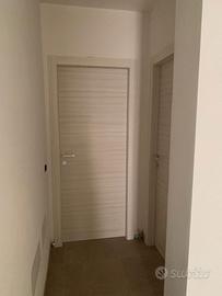 Porte qualità italy Spissu finestre persiane posa