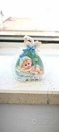 statuetta in resina con bimbo e cicogna arredo