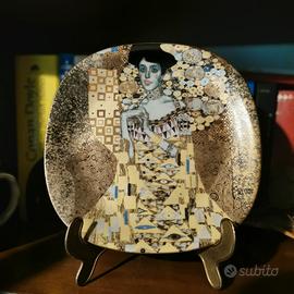 Coppia di piatti con dipinti di Klimt