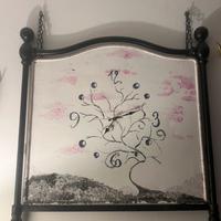 Orologio dipinto a mano su testata ferrobattuto