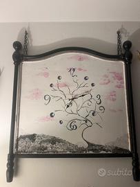 Orologio dipinto a mano su testata ferrobattuto