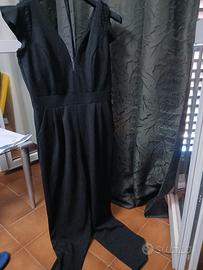 Tuta intera elegante nera con scollo a V e pizzo