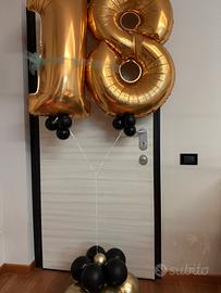 Palloncini 18 color oro e nero gonfiati con elio
