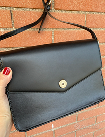 Pochette nera in vera pelle / Carpisa