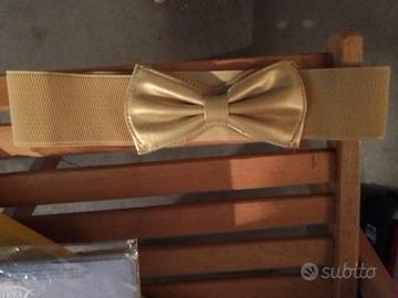 Cintura elastica fiocco giallo oro nuova