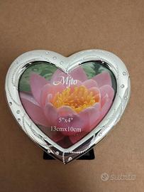 Cornice in argento a forma di cuore