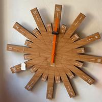 Raggiante orologio da parete in legno di Alessi