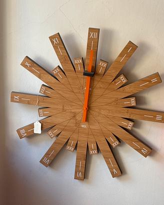 Raggiante orologio da parete in legno di Alessi
