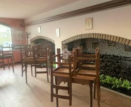 NEGOZIO A CARBONERA