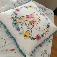 piumone e cuscino lettino bambino