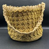 Borsa a secchiello all'uncinetto, color oro