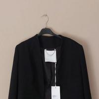 Giacca Nenette con etichetta