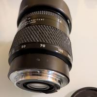 Obiettivo Tokina AT-X Aspherical con Paraluce