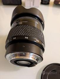 Obiettivo Tokina AT-X Aspherical con Paraluce