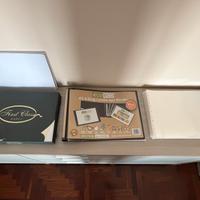 Raccoglitore ad anelli + buste perforate + risma