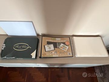 Raccoglitore ad anelli + buste perforate + risma