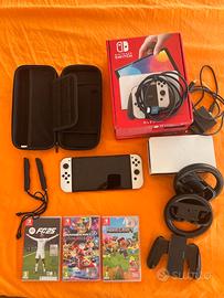 Nintendo Switch OLED Bianca + 3 Giochi (FC25/Mario